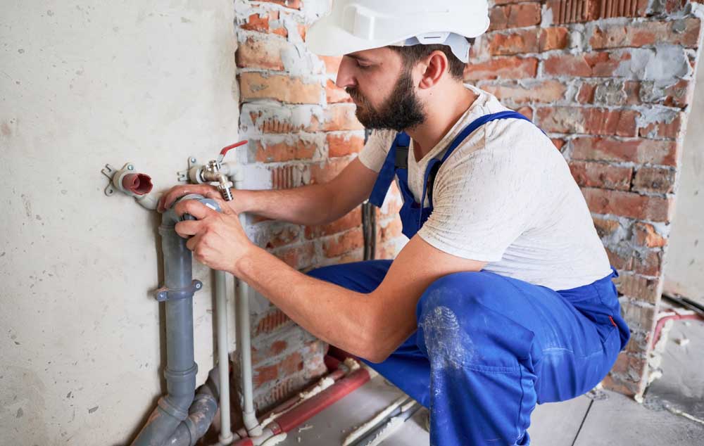 plumber fixing sewer pipe Staunton, VA