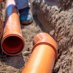 Plumbers excavating sewer line Charlottesville, VA