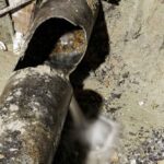 destroyed cast iron pipes