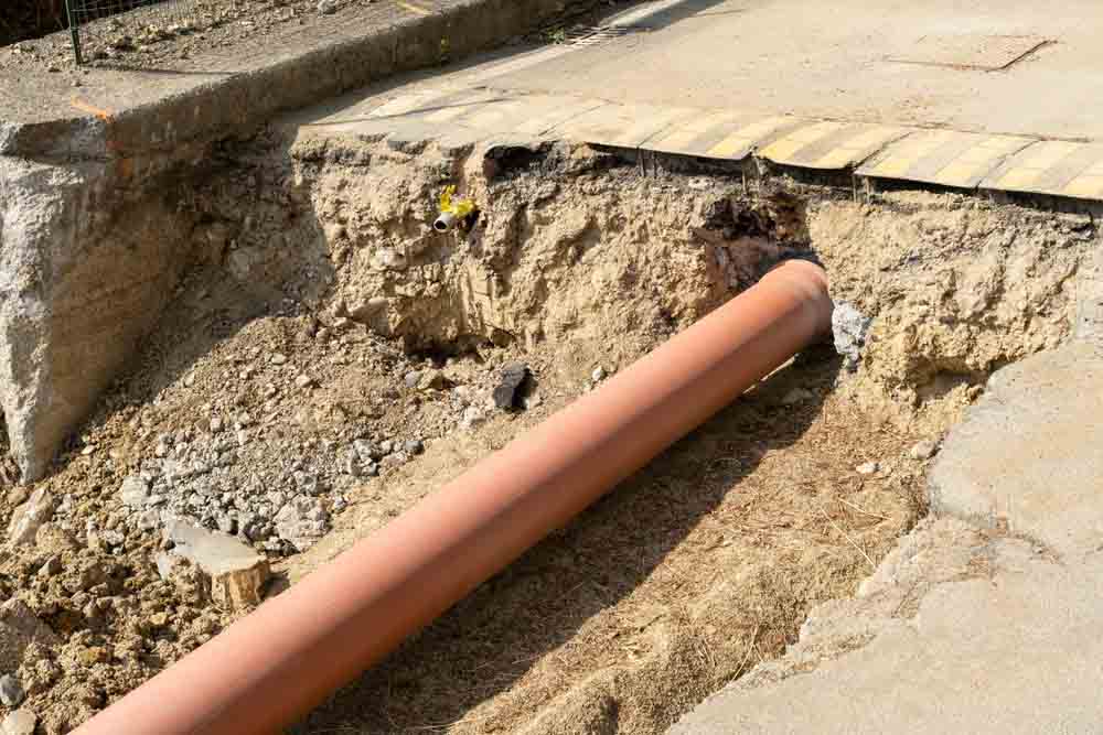 exposed sewer line
