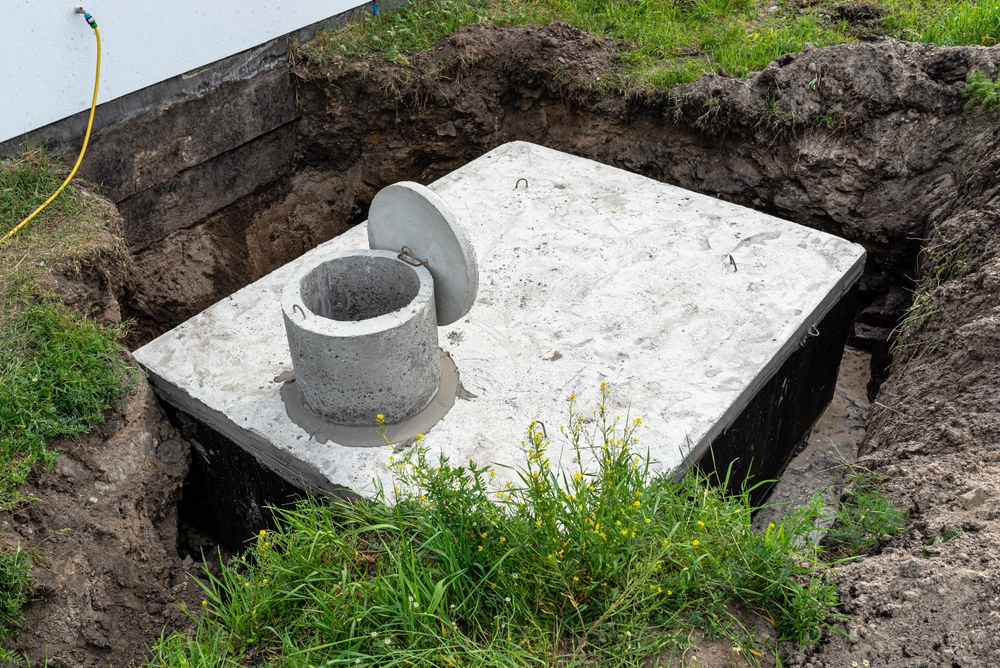 Concrete septic tank with a capacity of 10 cubic meters placed in the garden