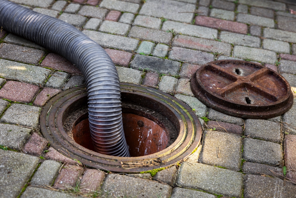 Pumping out household septic tank. drain and sewage cleaning service